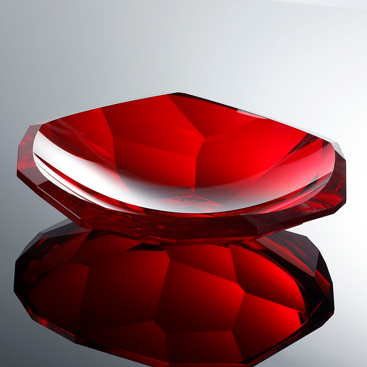 Angled view of red crystal faceted bowl