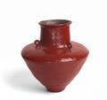 Red glazed ceramic amphora vase front view
