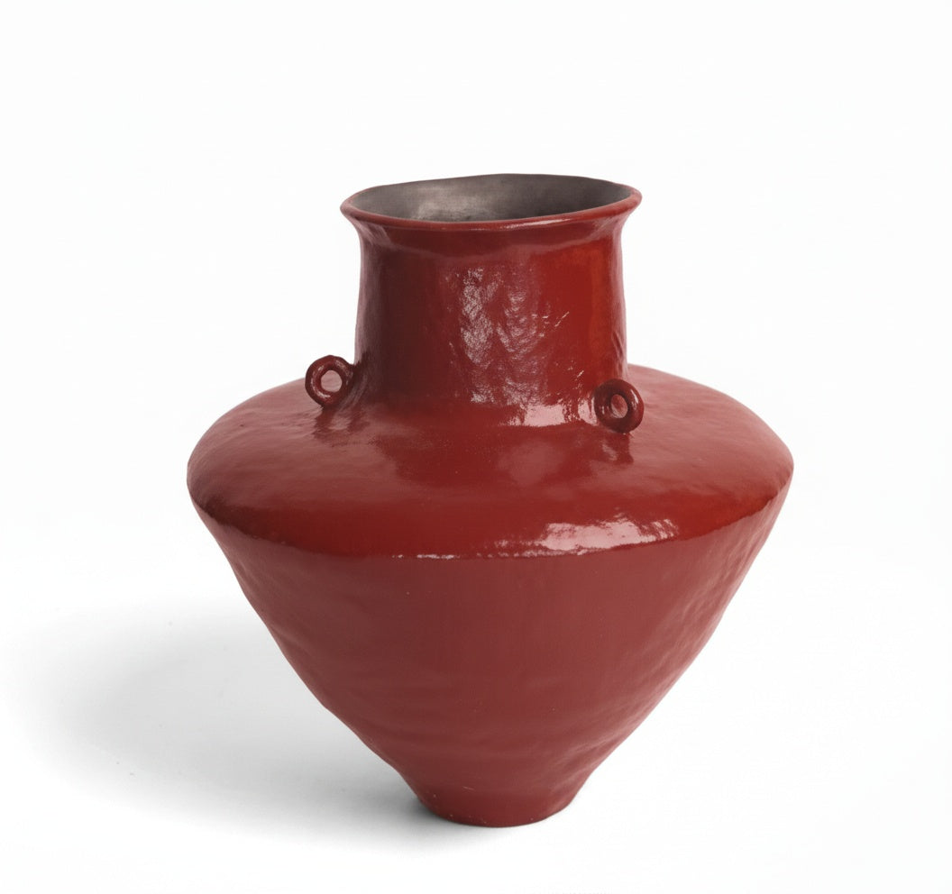 Red glazed ceramic amphora vase front view