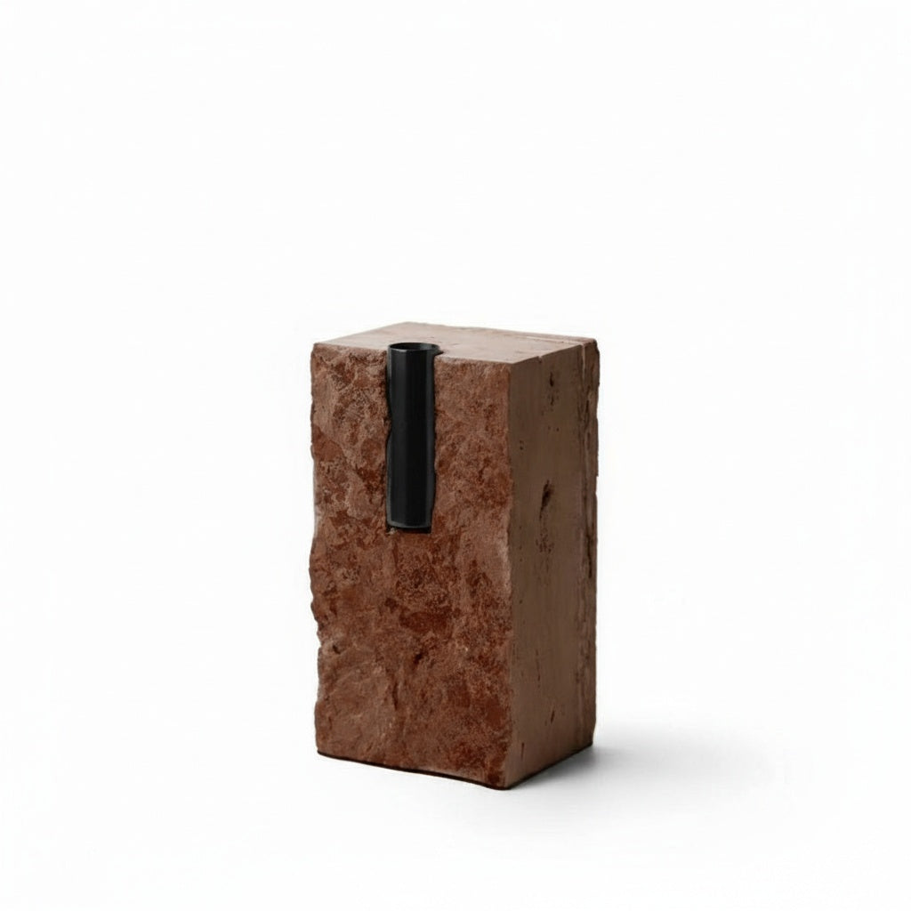Red travertine block vase with black metal insert front view