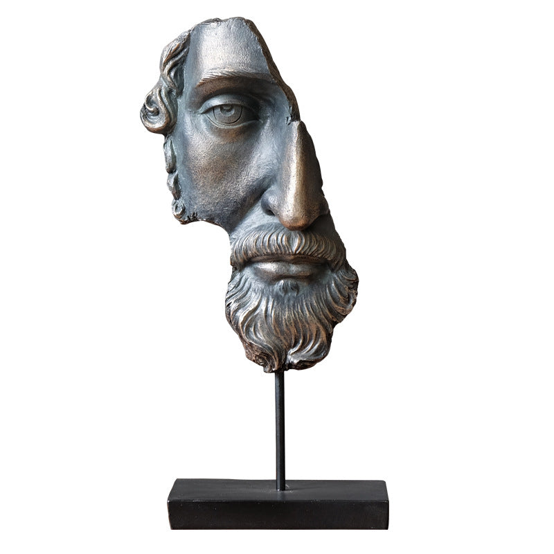 Side view of bronze finish fragmented classical male head sculpture