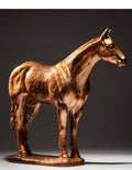 Side profile of bronze finish horse statue