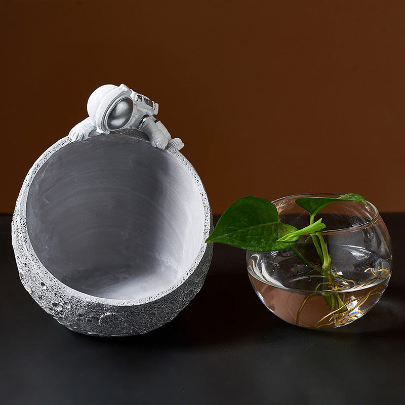 Back view of astronaut climbing lunar surface