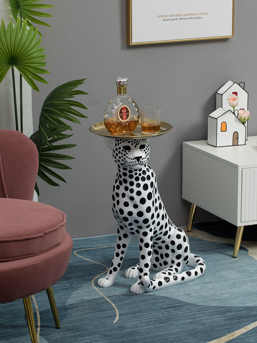 Side view of hand-painted resin leopard table sculpture