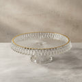 Ribbed crystal glass cake stand with gold rim detail