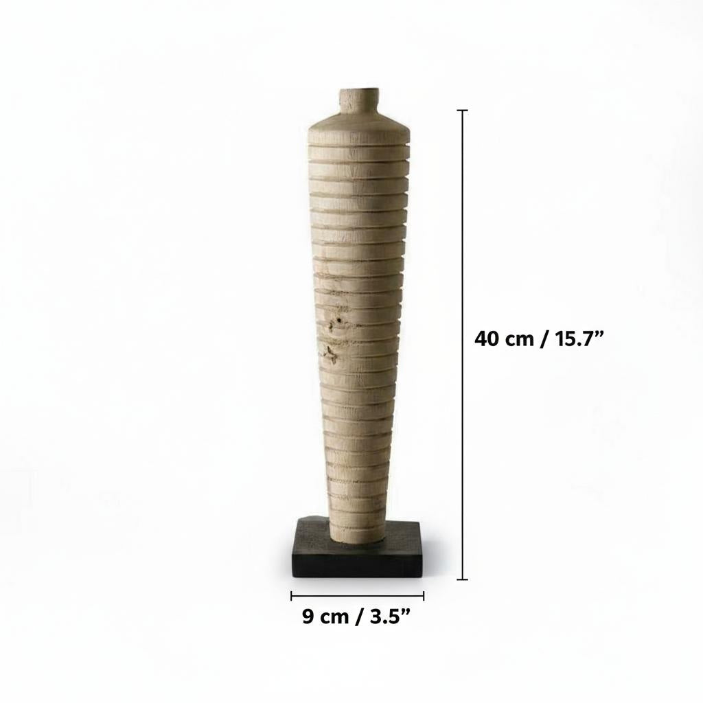 Detail of whitewashed ribbed wood bottle sculpture