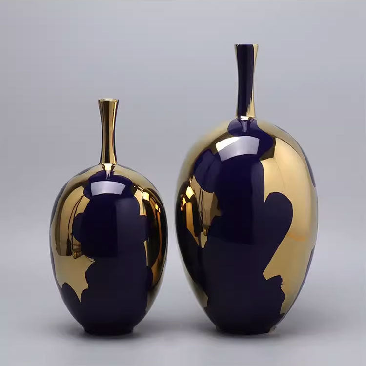 Set of two luxury blue and gold vases on grey background