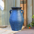 Front view of rustic blue ceramic amphora vase with ribbed texture