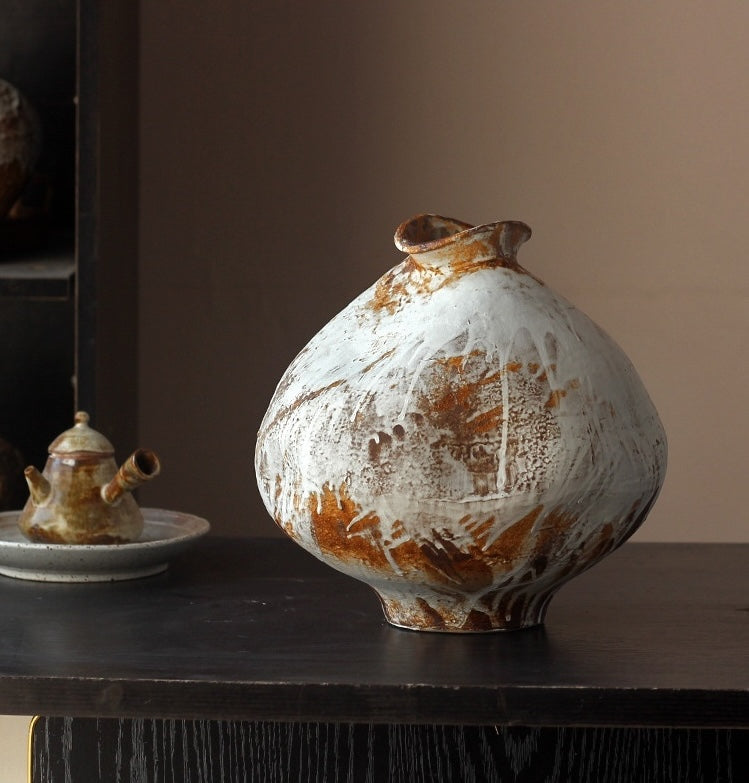 Medium round ceramic vase with distressed white and rust finish