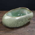 Rustic green glazed ceramic oval planter top view