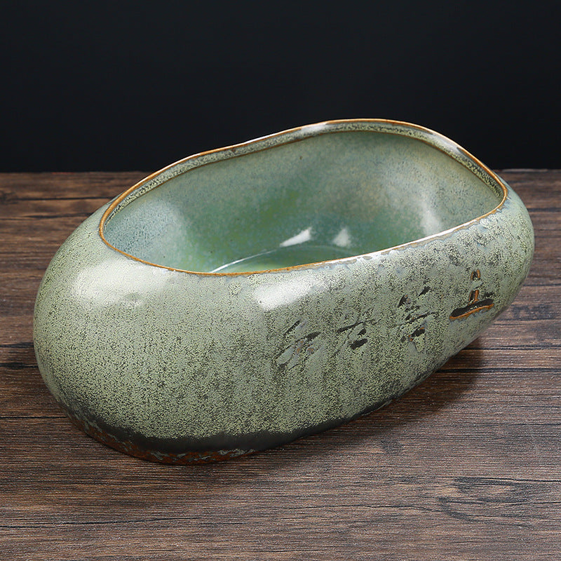 Rustic green glazed ceramic oval planter top view