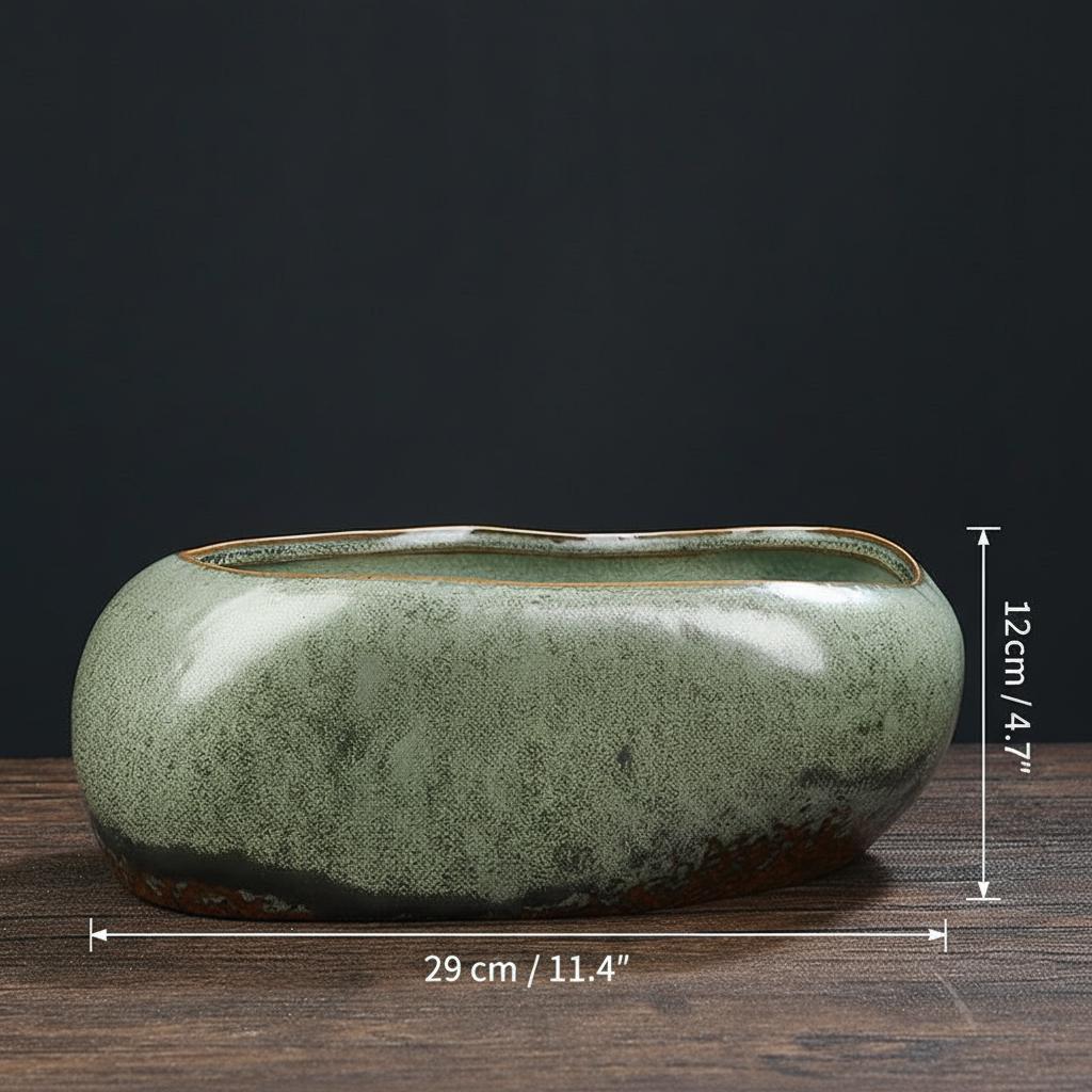 Dimensions of rustic green ceramic planter