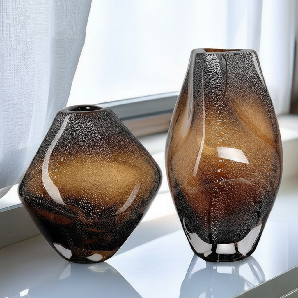Close up of seeded glass texture on amber vases