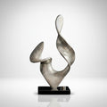 Front view of textured silver abstract twisted sculpture on black base