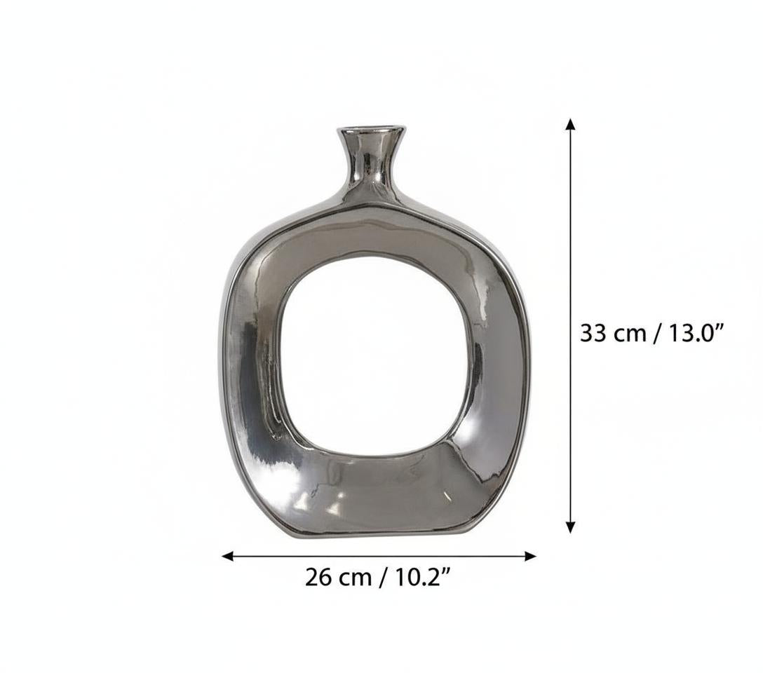 Front view of large silver circular vase with mirror finish