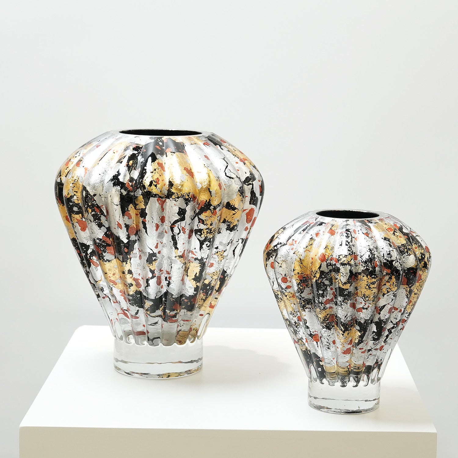 Group shot of large and medium metallic speckled vases