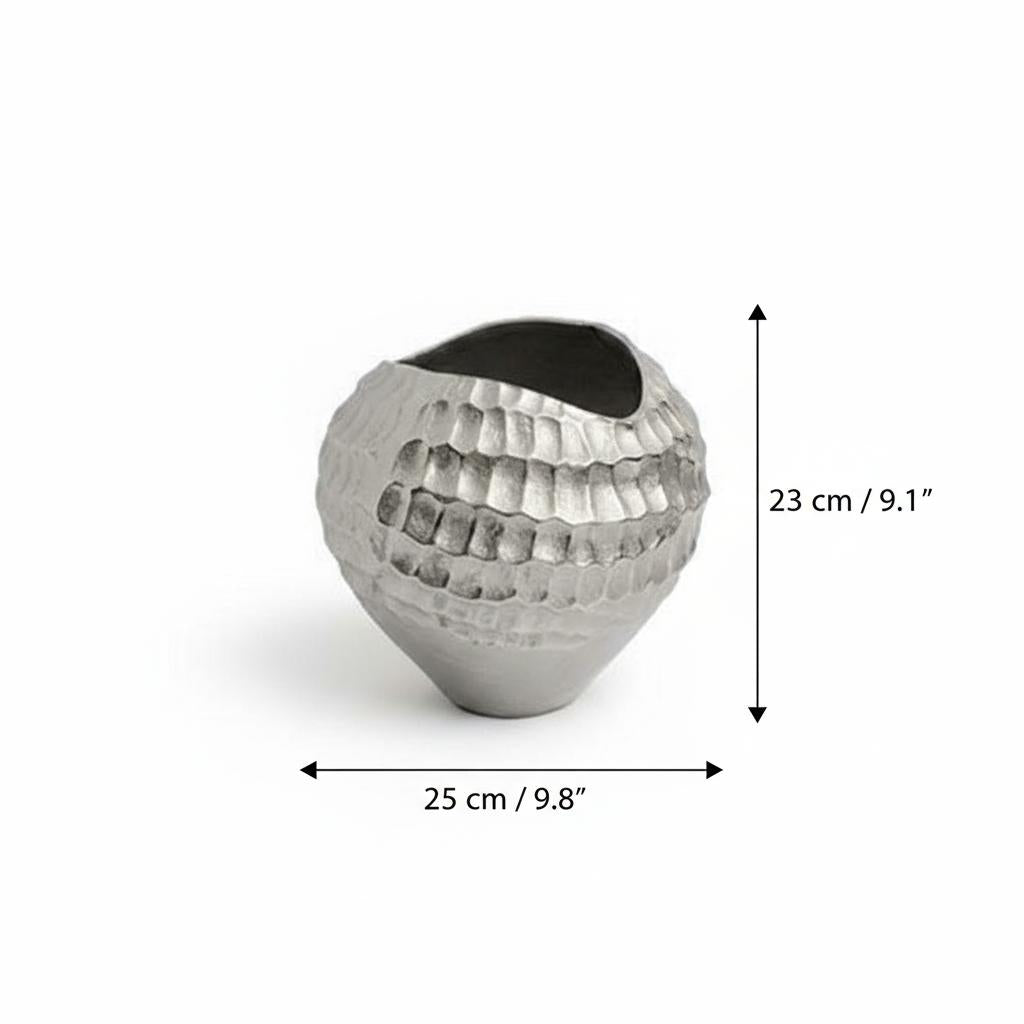 Close up of silver hammered finish ceramic vase isolated