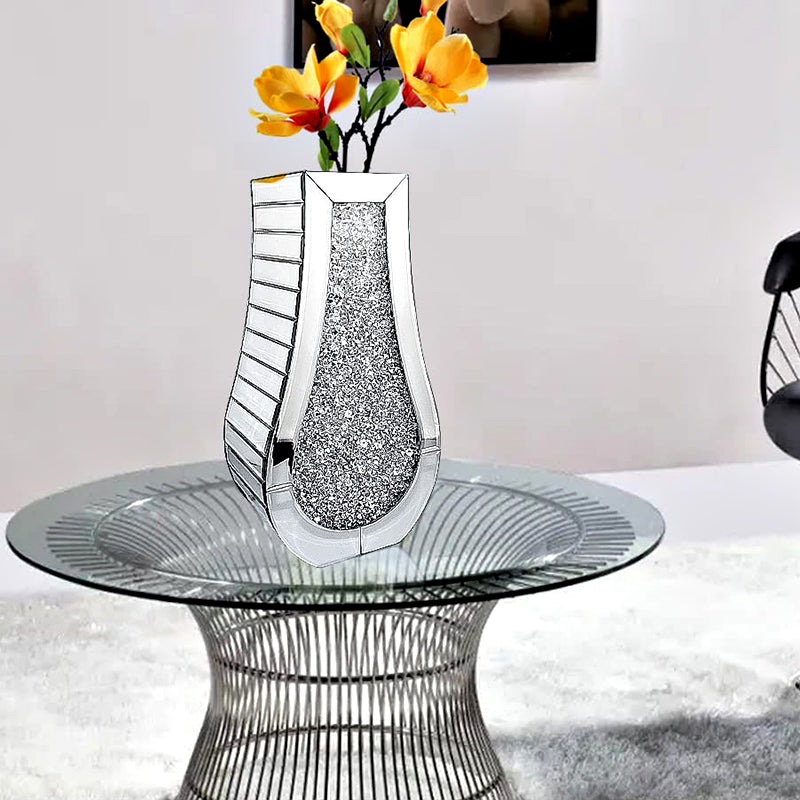 Angled view of mirrored crystal vase on modern table