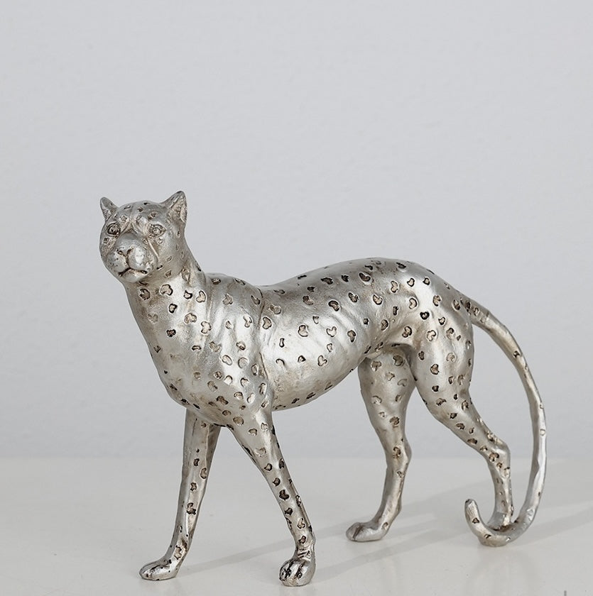 Silver finish resin leopard sculpture angled front view
