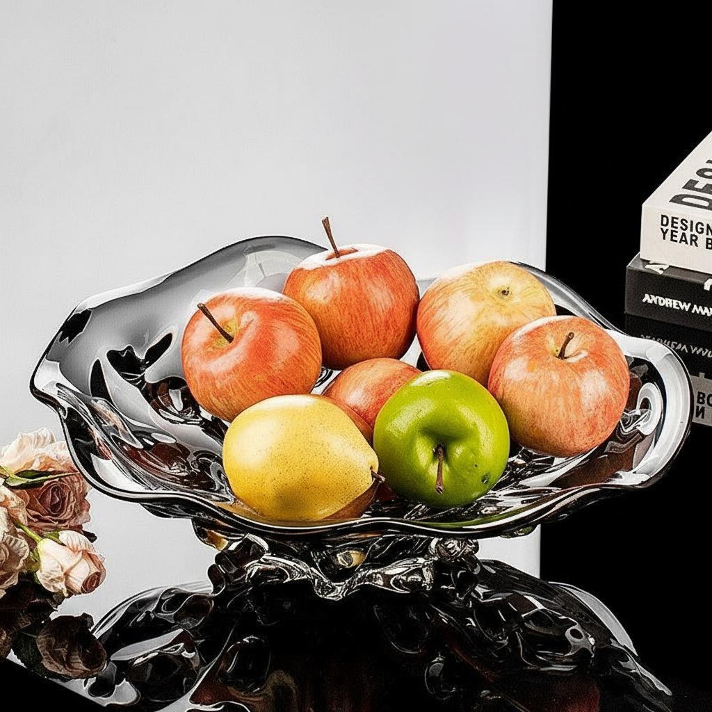 Silver smoked glass fruit bowl filled with apples and pears