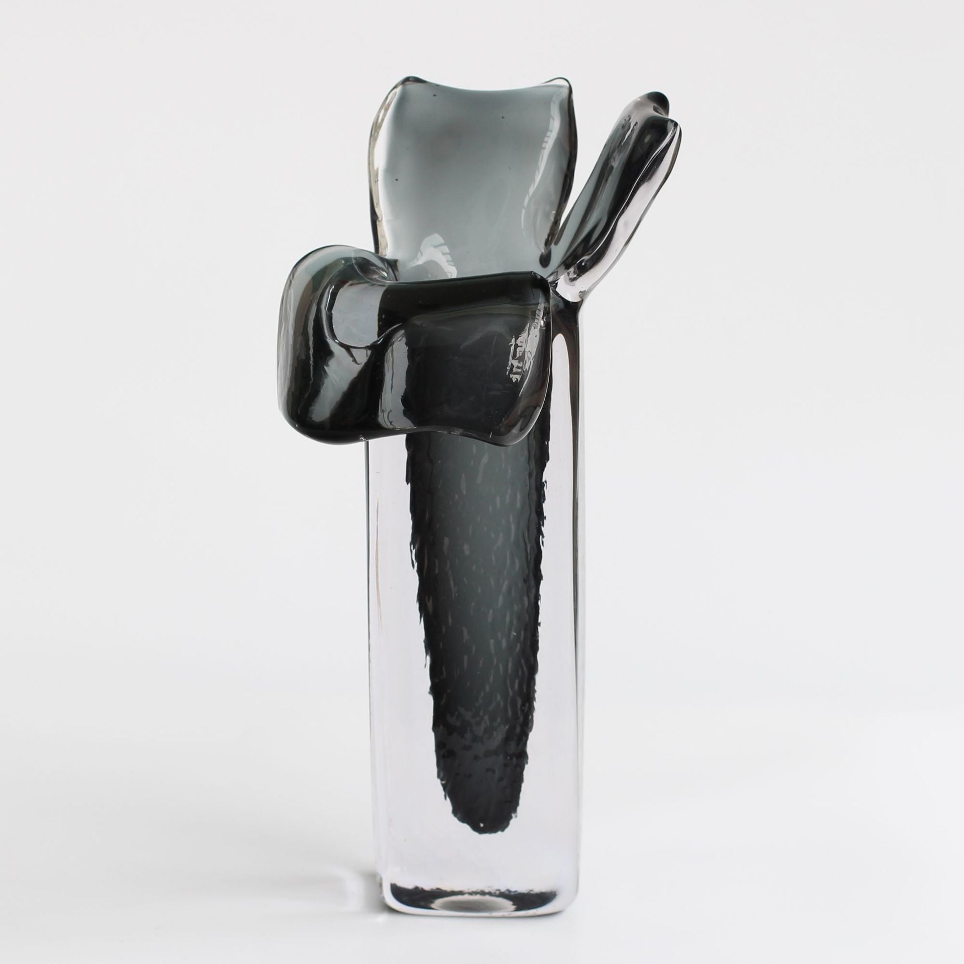 Detail view of large smoke grey vase rim and suspended core