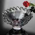 Smoke grey art glass bowl with wavy rim side view