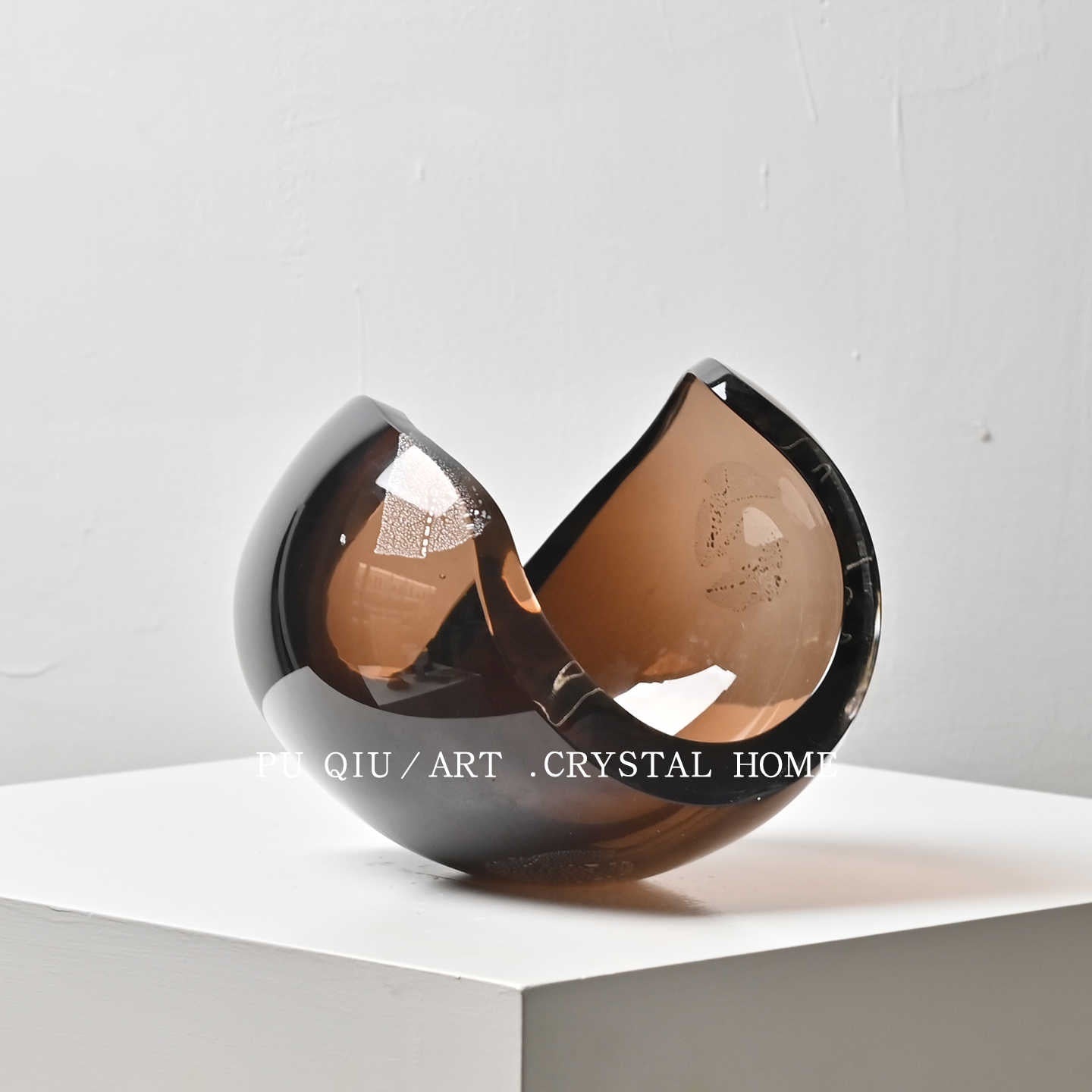 Angled view of bronze glass decor object