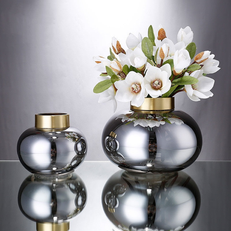 Smoked grey glass vases with gold rims styling with white flowers