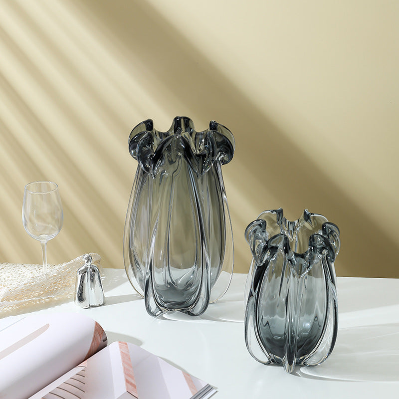 Comparison of large and medium glass vases