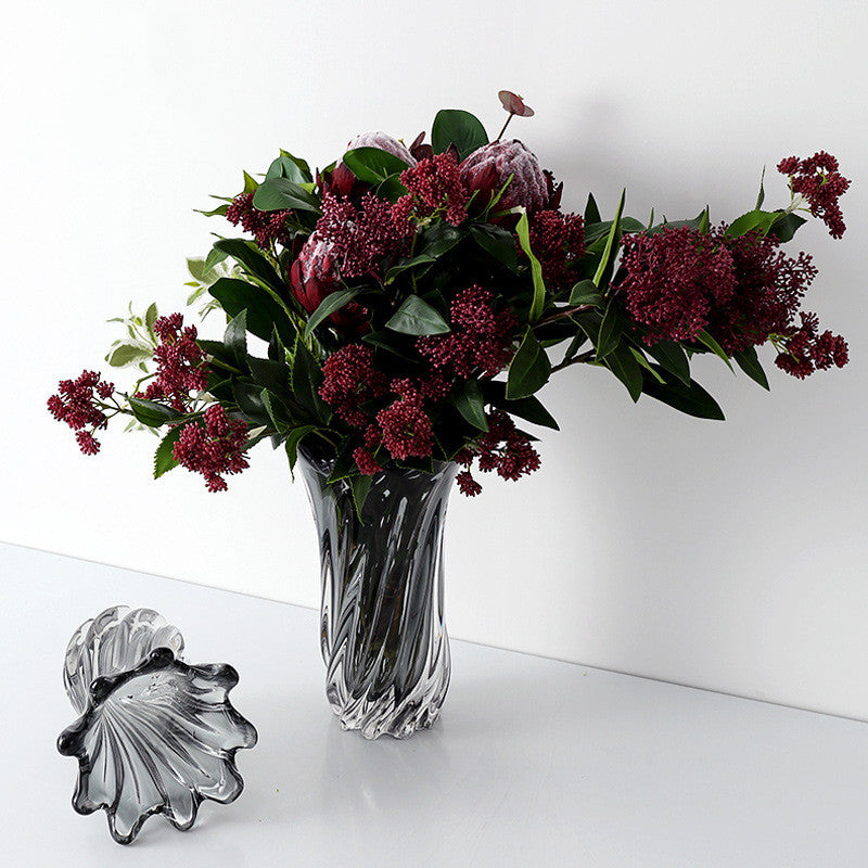 Overhead view of scalloped rim on smoked glass vase