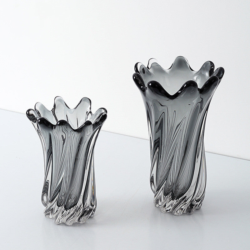 Large and medium grey swirl glass vases side by side