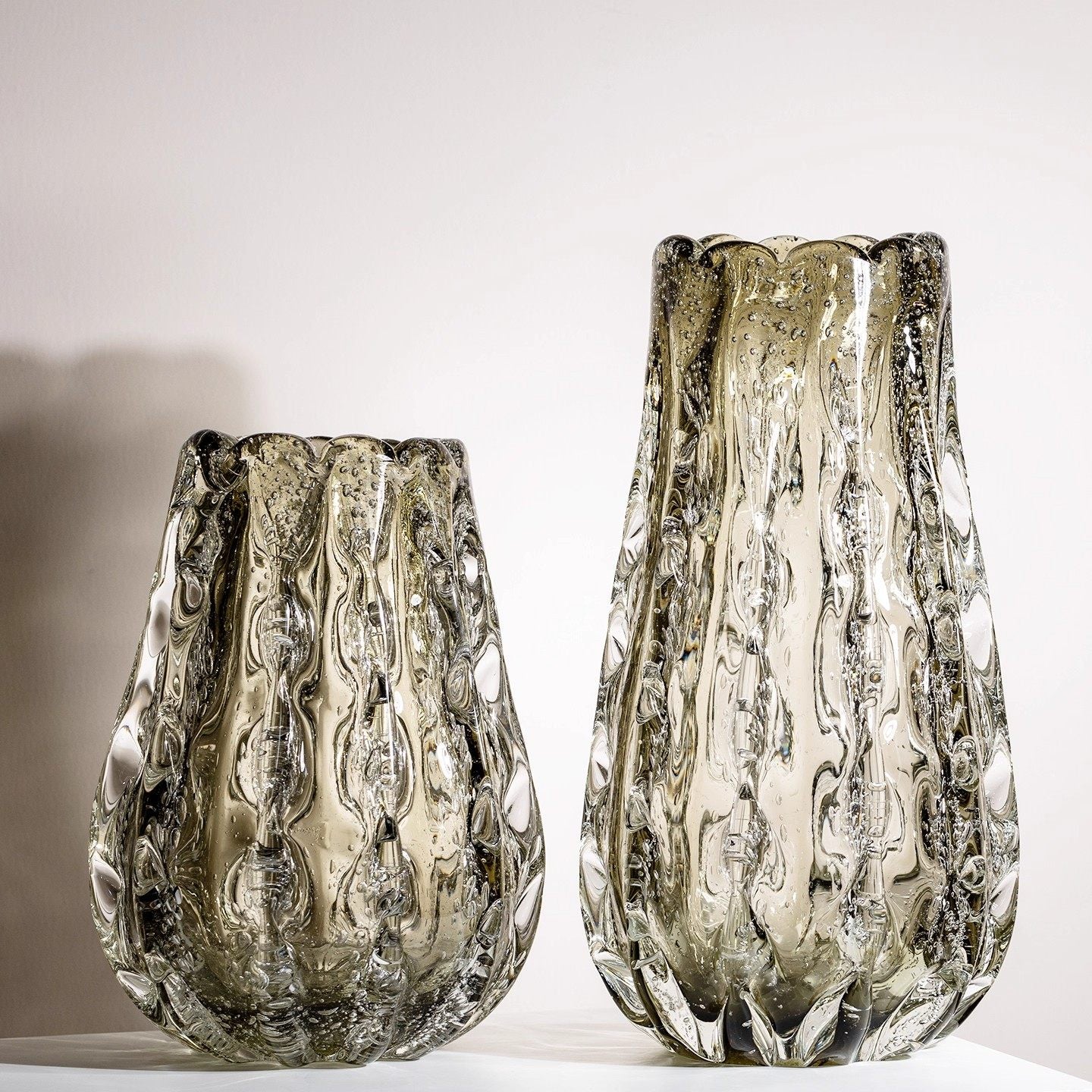 Set of two smoked textured glass vases