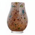 Speckled amber and blue art glass vase with gold flecks on white background