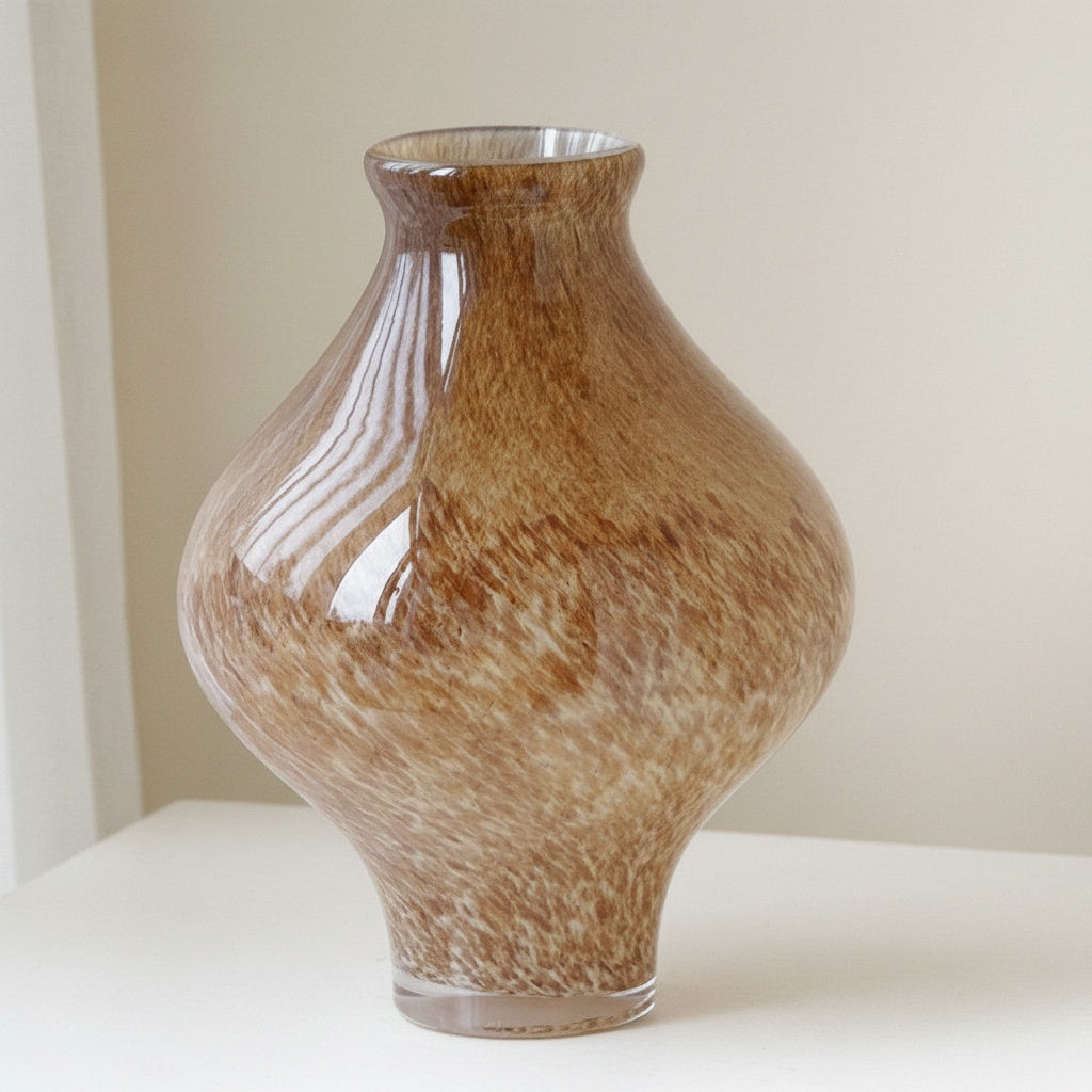 Close up of bulbous glass vase pattern and form