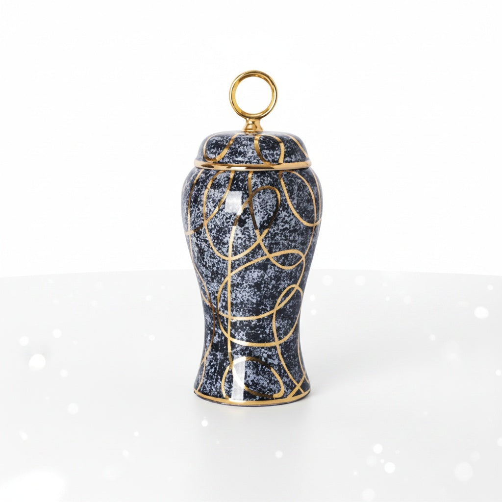 Full View Of Speckled Black And Gold Ceramic Lidded Jar