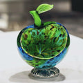 Front view of speckled art glass apple bowl