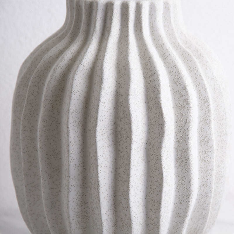 Close up detail of matte speckled ceramic texture and ribbed design