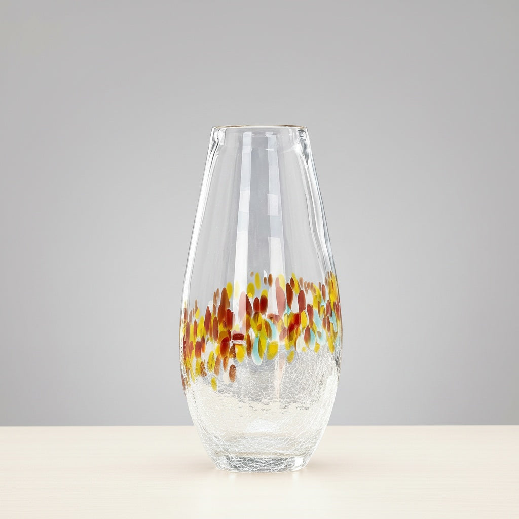Large empty speckled glass vase showing crackle texture
