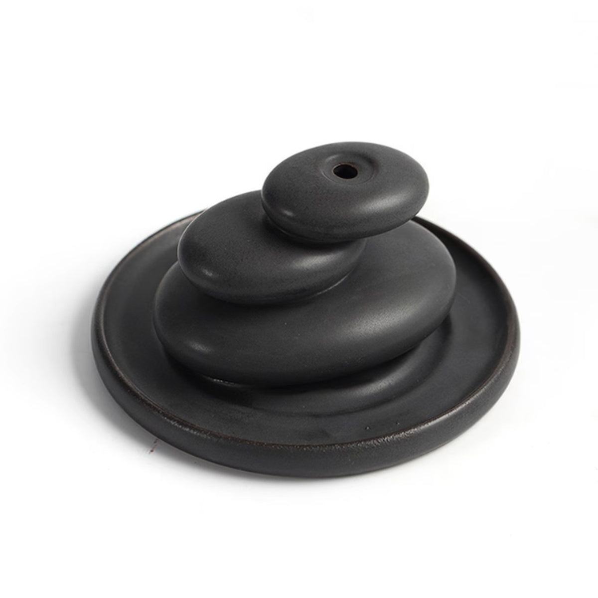 Top view of black ceramic stacked stone incense burner with round tray base