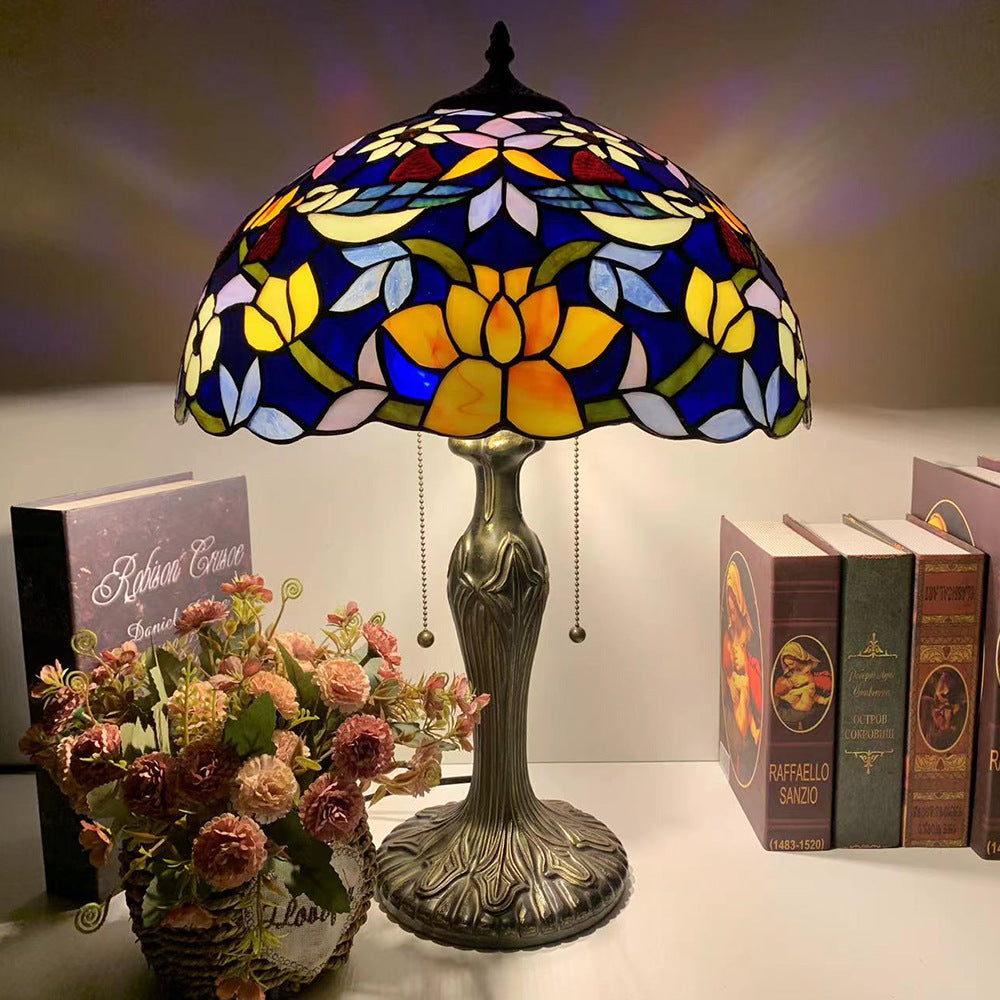 Stained glass table lamp with antique metal base