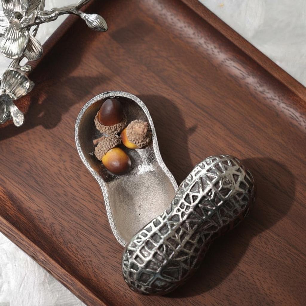 Top view of open peanut shaped metal storage box