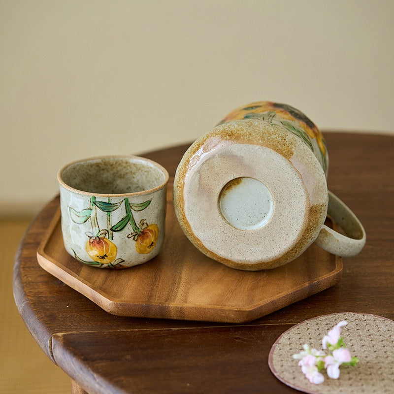 Pouring tea from the sunflower stoneware pitcher
