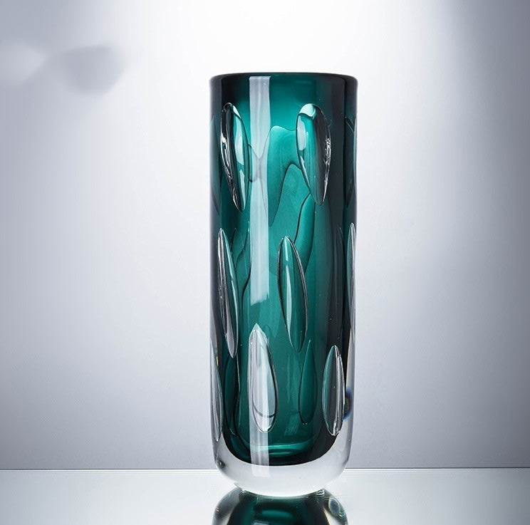 Teal art glass cylindrical vase with oval cut details
