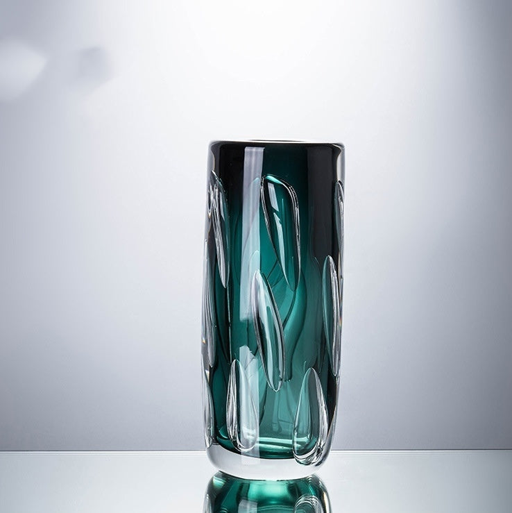 Emerald green glass vase front view showing texture