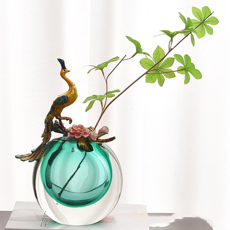 Teal art glass vase with enamel peacock sculpture front view