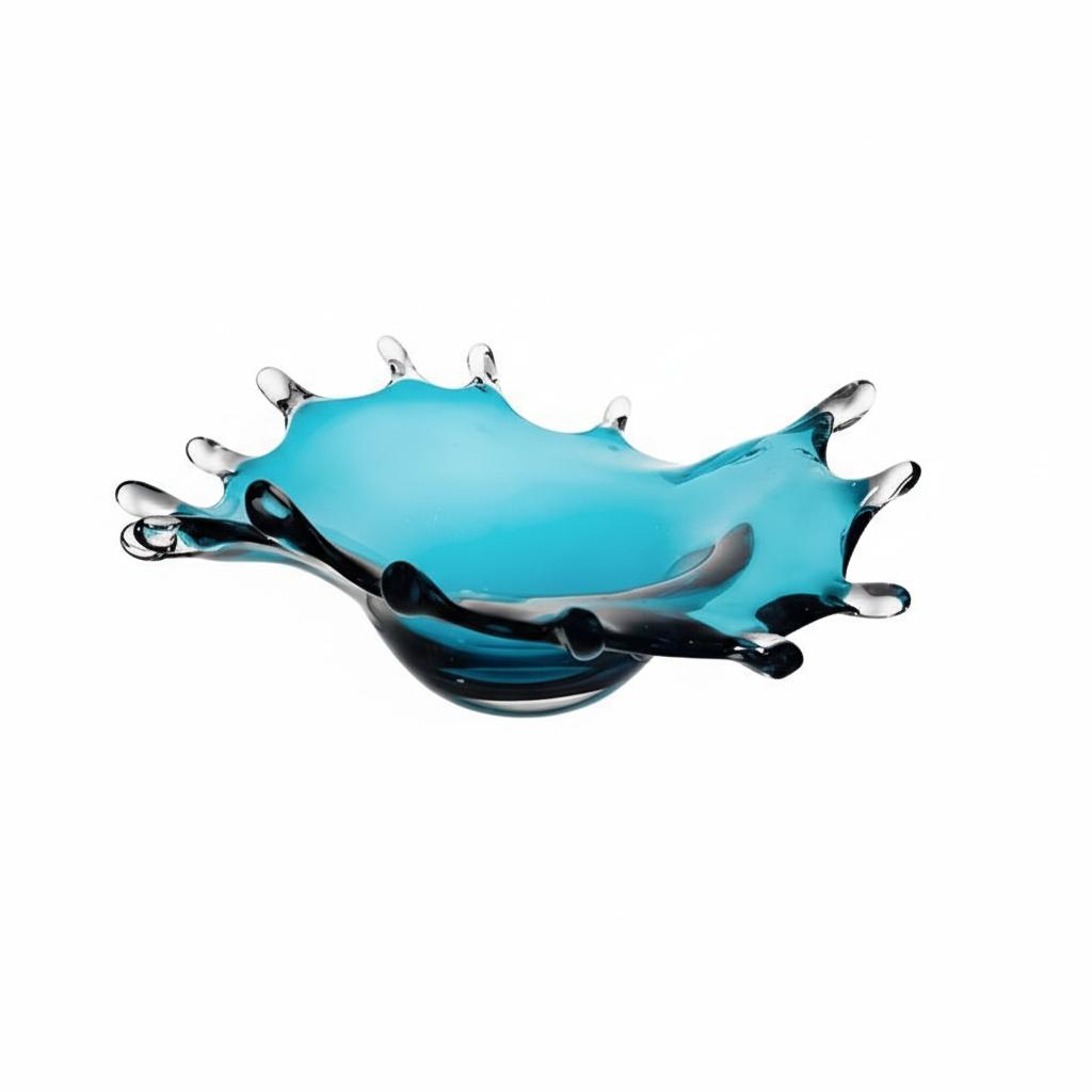 Side view of low teal art glass splash bowl