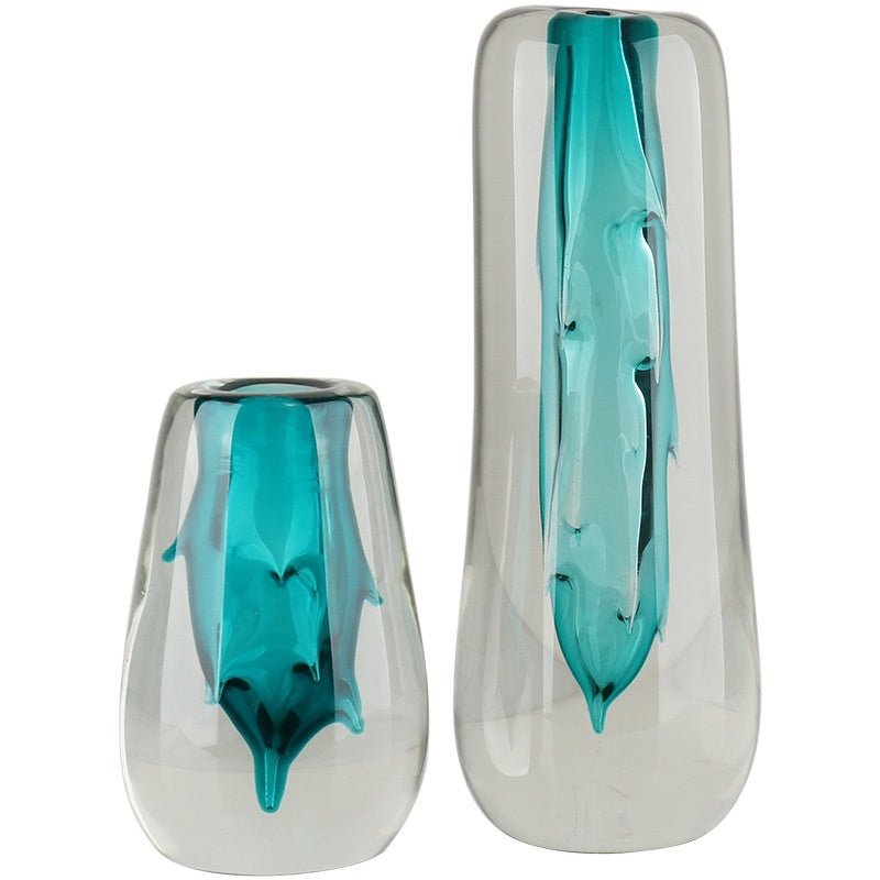 Teal organic droplet glass vases studio shot