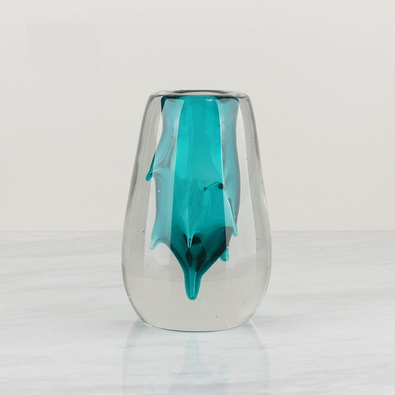 Large teal glass vase front view