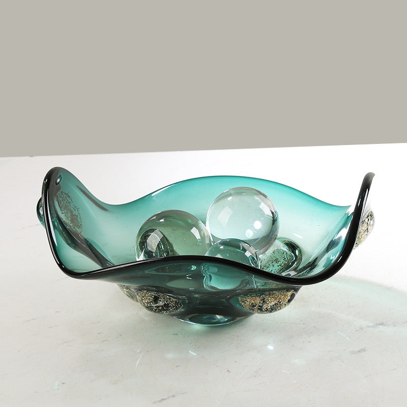 Teal wavy glass centerpiece bowl with decorative spheres