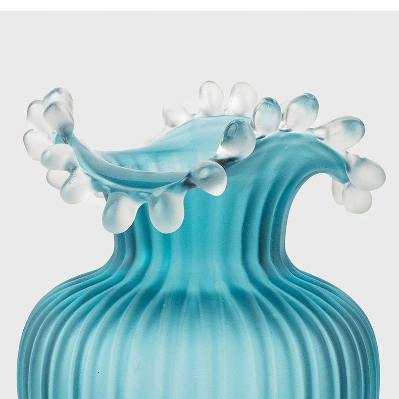 Detail of ruffled rim with clear glass droplets